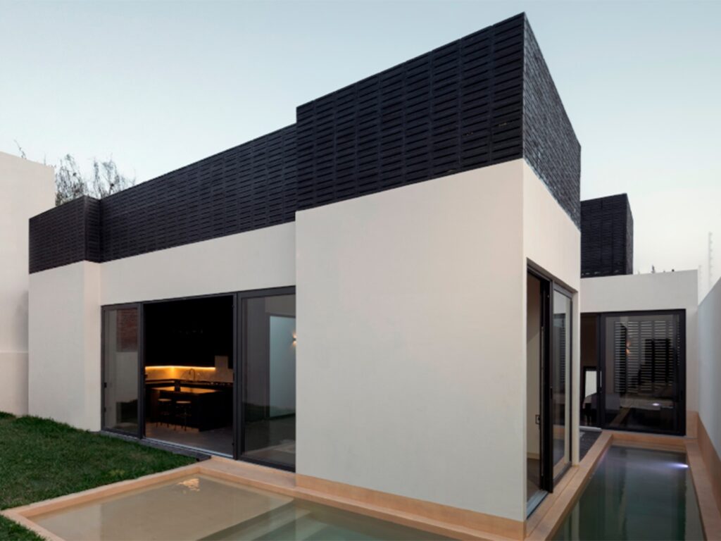 8. FACHADA POSTERIOR Casa Brisas WIDOARQUITECTOS
